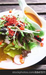 Close up of Healthy salad on white plate, Healthy lifestyle concept