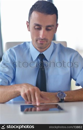 close-up of human hand business man using tablet compuer at office