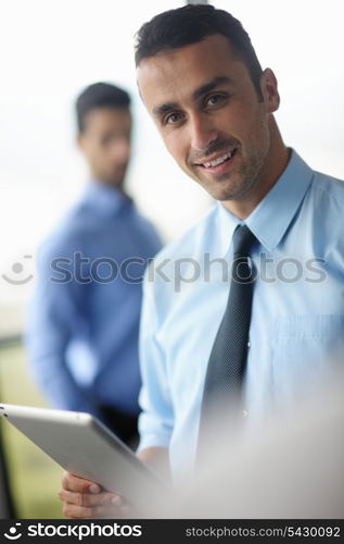 close-up of human hand business man using tablet compuer at office