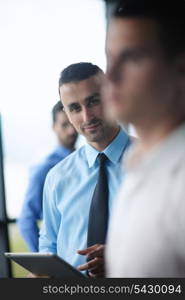 close-up of human hand business man using tablet compuer at office