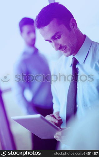 close-up of human hand business man using tablet compuer at office