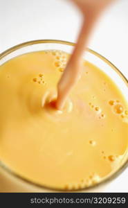 Close-up of juice being poured into a glass