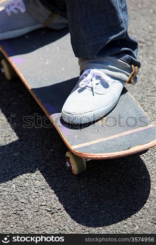 Close-up of kid on skateboard