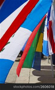 Close-up of Latin American flags