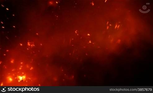 Close up of lava exploding out from a lava tube in Hawaii at night