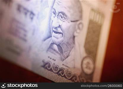 Close-up of Mahatma Gandhi on a one hundred rupee note