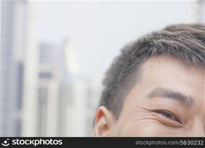 Close Up of Male Eye and Face Smiling in Beijing