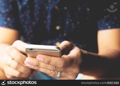 Close up of man hand using mobile smartphone, Technology lifestyle concept. Selective focus