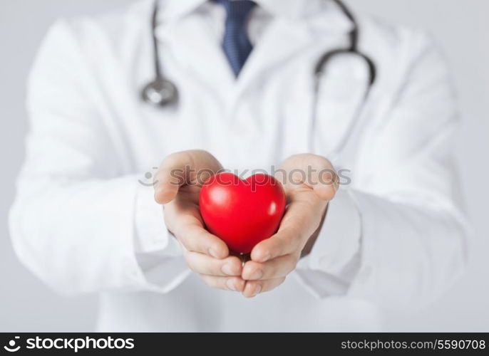 close up of man hands with heart