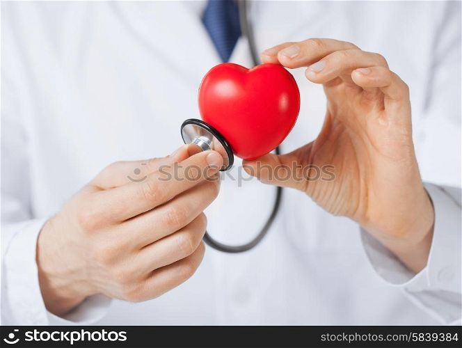 close up of man hands with heart. man hands with heart
