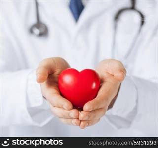 close up of man hands with heart. man hands with heart