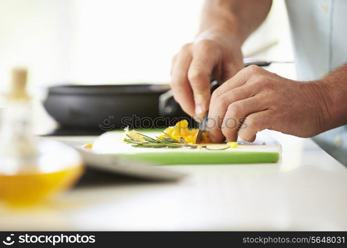 Close Up Of man Preparing Ingredients For Meal