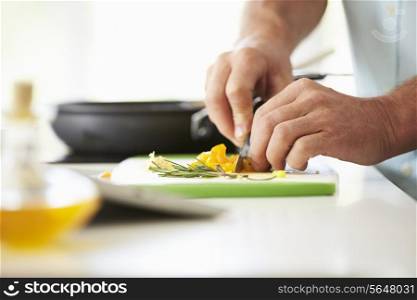 Close Up Of man Preparing Ingredients For Meal