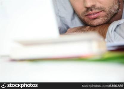 Close-up of man reading