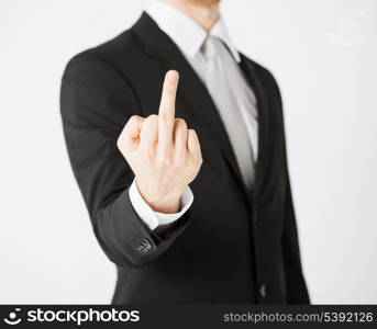 close up of man showing middle finger