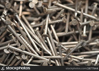 Close up of many metal nails in box