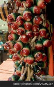 Close-up of maracas hanging in a store