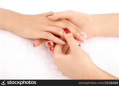 Close up of massage of the female hand, isolated