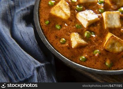 Close up of Mattar Paneer or cottage cheese with Peas. A vegetarian Indian delicacy 