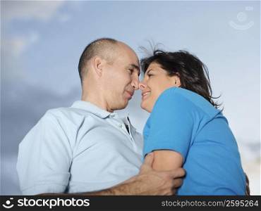 Close-up of mature couple nuzzling