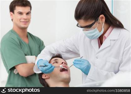 Close-up of medical dentist procedure of teeth cleaning