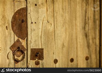 Close up of metal lock and handle on wooden door, Shanxi Province, China