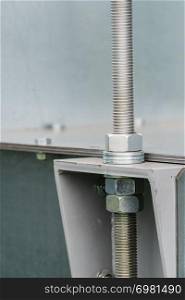 Close up of metal, steel pipe in agricultural machine vahicle. Industrial details. Steel pipe in agricultural machine
