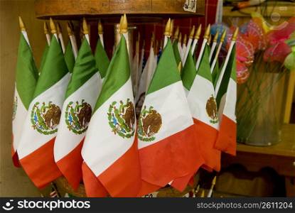 Close-up of Mexican flags in a store