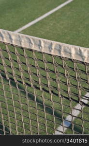 close-up of net on an outdoor tennis court