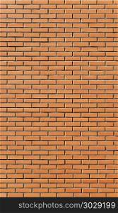 Close up of new orange brick wall. New brick wall surface