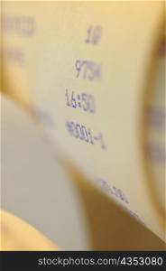 Close-up of numbers on a scroll receipt