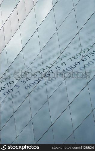 Close-up of numbers reflected on glass