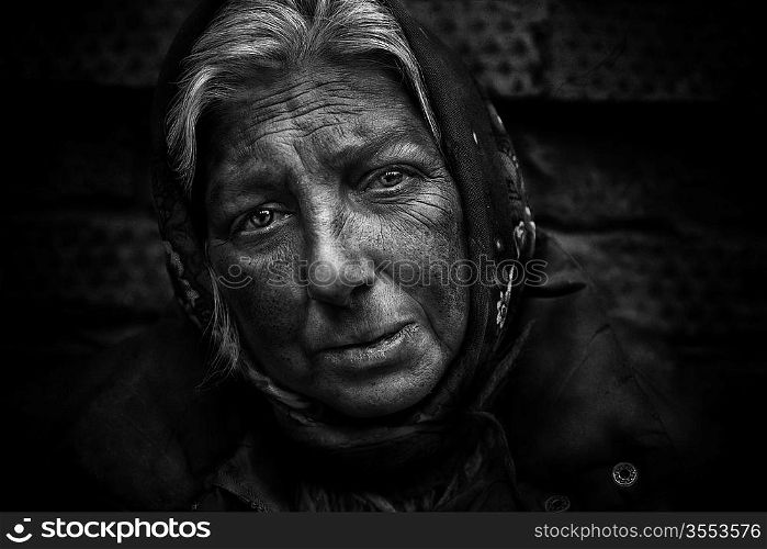 close up of old woman, she live on the street