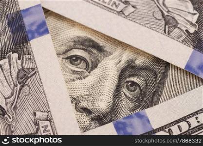 Close-up of one hundred bill Franklin portrait