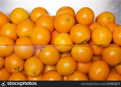 Close-up of Oranges heap background. Stock