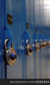 Close up of padlocks on blue school lockers