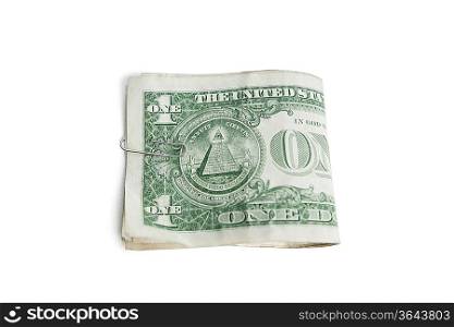 Close-up of paper dollars in clip over white background