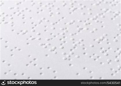 Close up of paper page with braille text