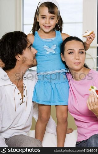 Close-up of parents and their daughter