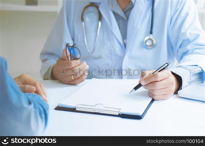 close up of patient and medicine doctor at a hospital / clinic