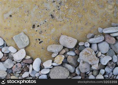 Close-up of pebbles on rock surface