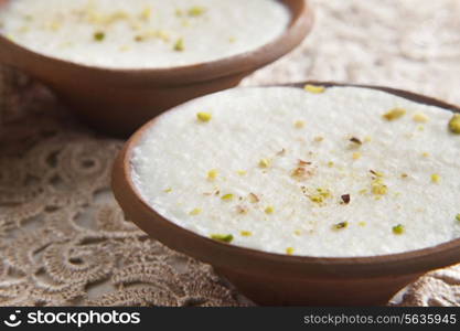 Close-up of phirni served in bowls on table