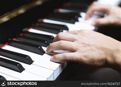 close up of piano keyboard with selective focus keys. can be used as a background.