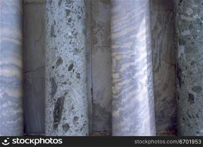 Close-up of pillars of assorted stone