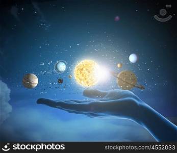 Close up of planet sun system in your hand. Sun system