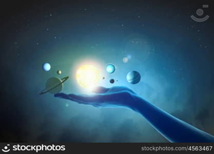 Close up of planet sun system in your hand. Sun system