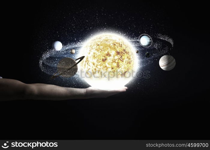 Close up of planet sun system in your hand. Sun system