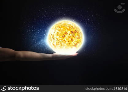 Close up of planet sun system in your hand. Sun system