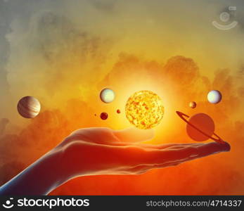 Close up of planet sun system in your hand. Sun system