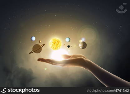 Close up of planet sun system in your hand. Sun system